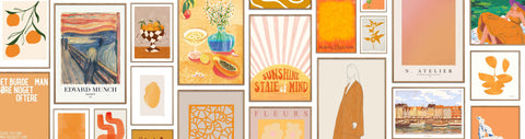 A collection of orange posters framed and displayed on the wall