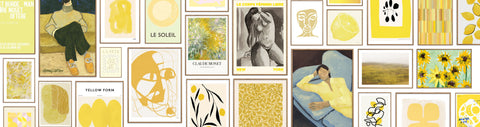 A collection of yellow posters framed and displayed on the wall